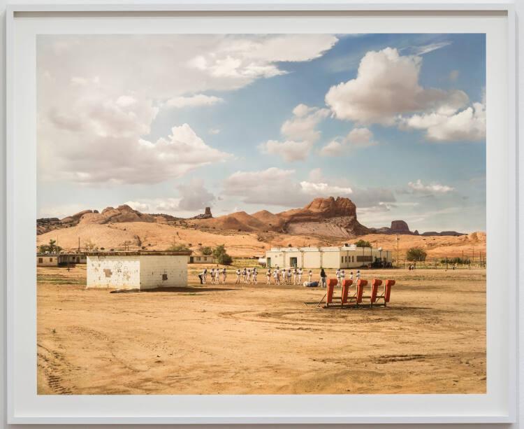 Joel Sternfeld, The Eagles of Kayenta Junior High School at Football Practice, Kayenta, Arizona…